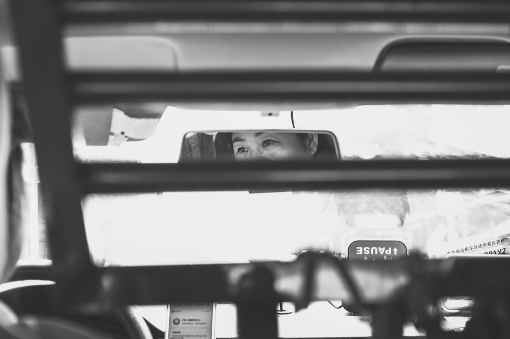 grayscale photo of car side mirror