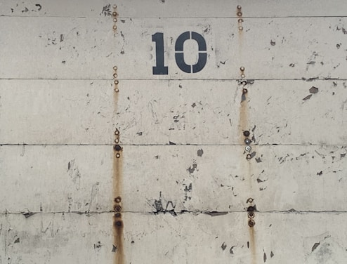 white and brown number 10