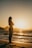 silhouette of woman standing on seashore during sunset