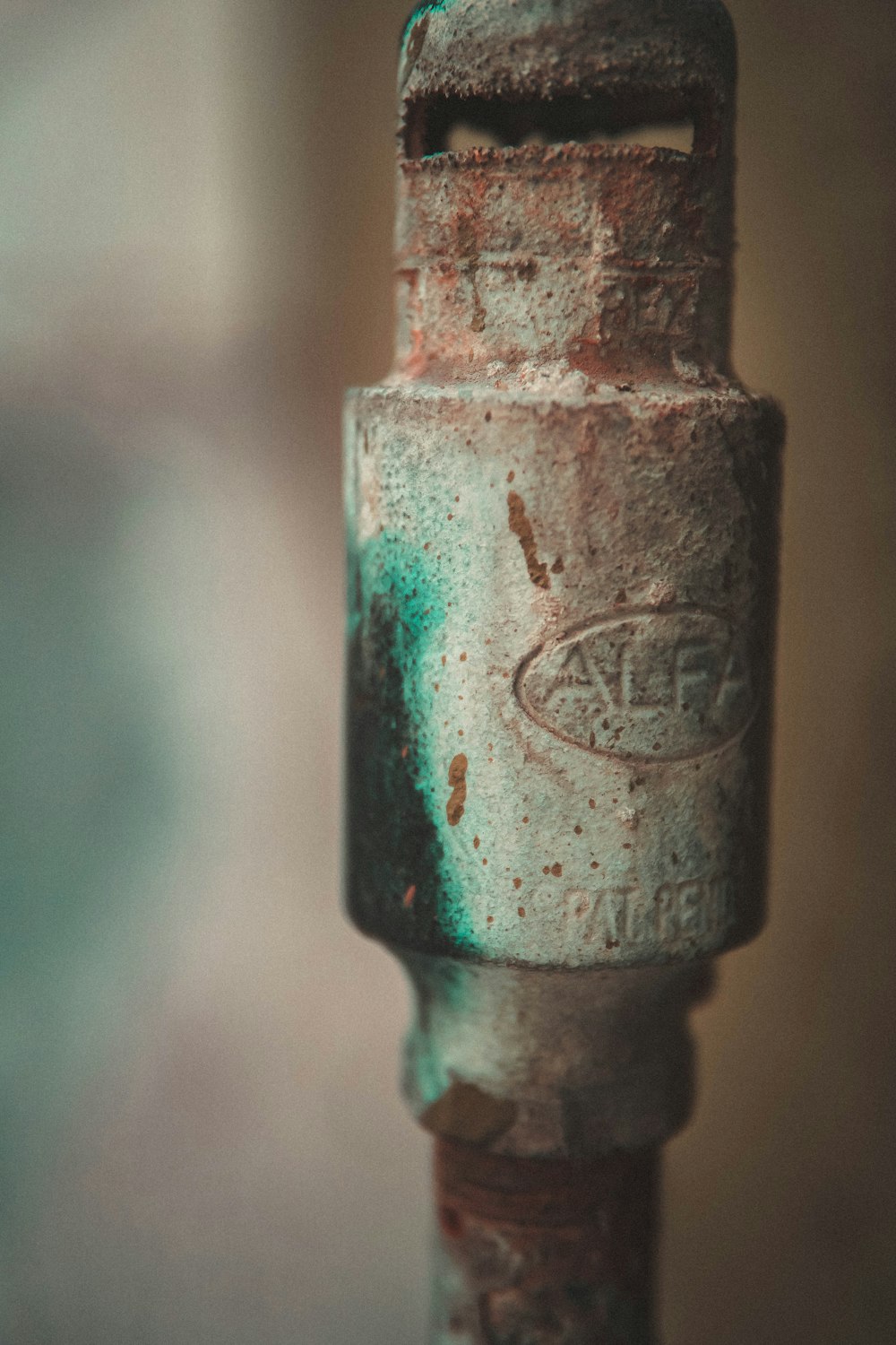 silver steel tube with green background