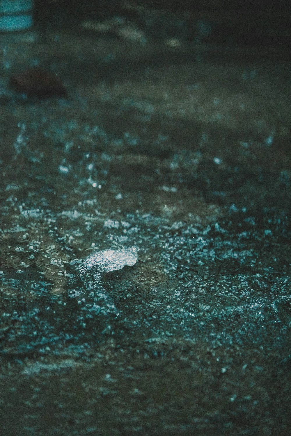 water droplets on brown surface