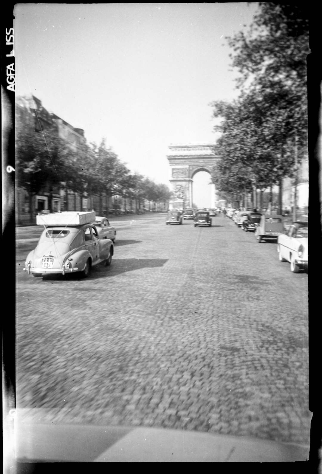 grayscale photo of cars on road