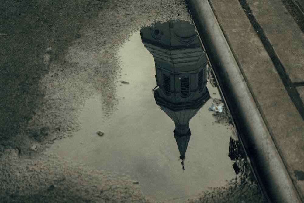 grayscale photo of water on road