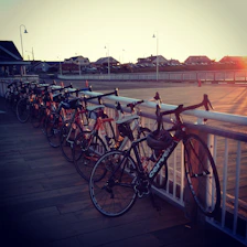 A scenic shot of rental bikes lined up along Puri’s beach road at sunset.