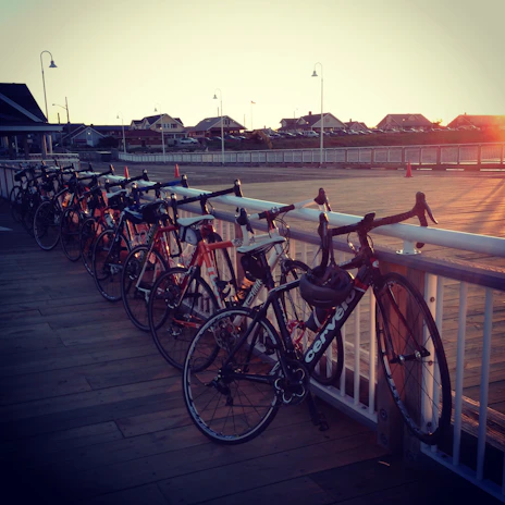 A scenic shot of rental bikes lined up along Puri’s beach road at sunset.