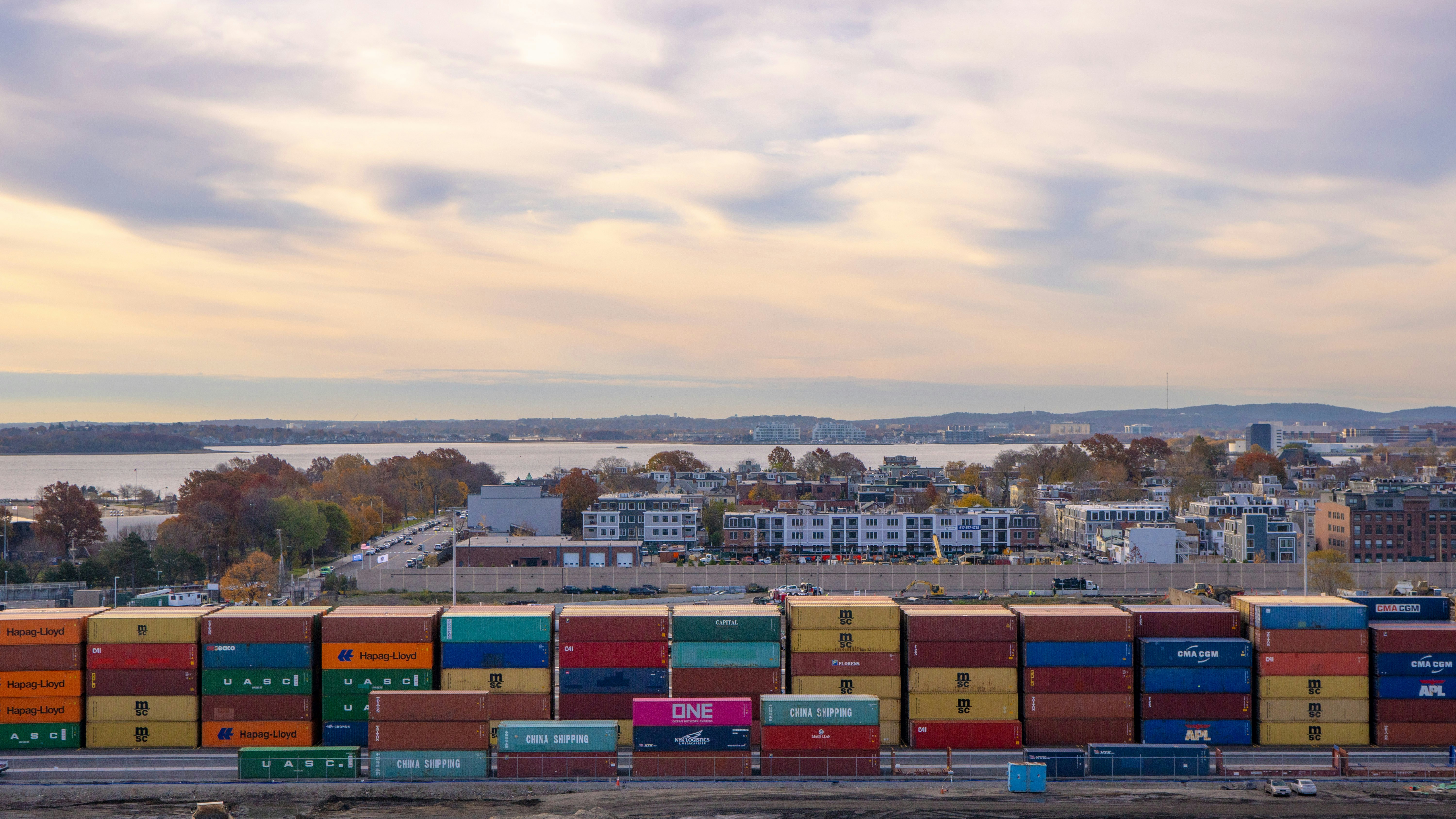 global shipping containers at sunset