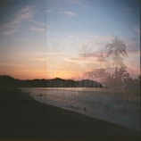 Sunset over turquoise waters at a quiet beach in Riviera Maya.