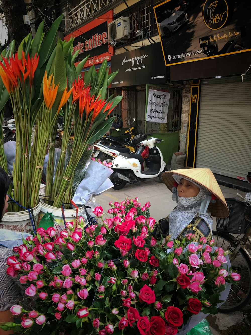 red and pink flowers on black motorcycle