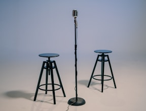 black and gray tripod stand