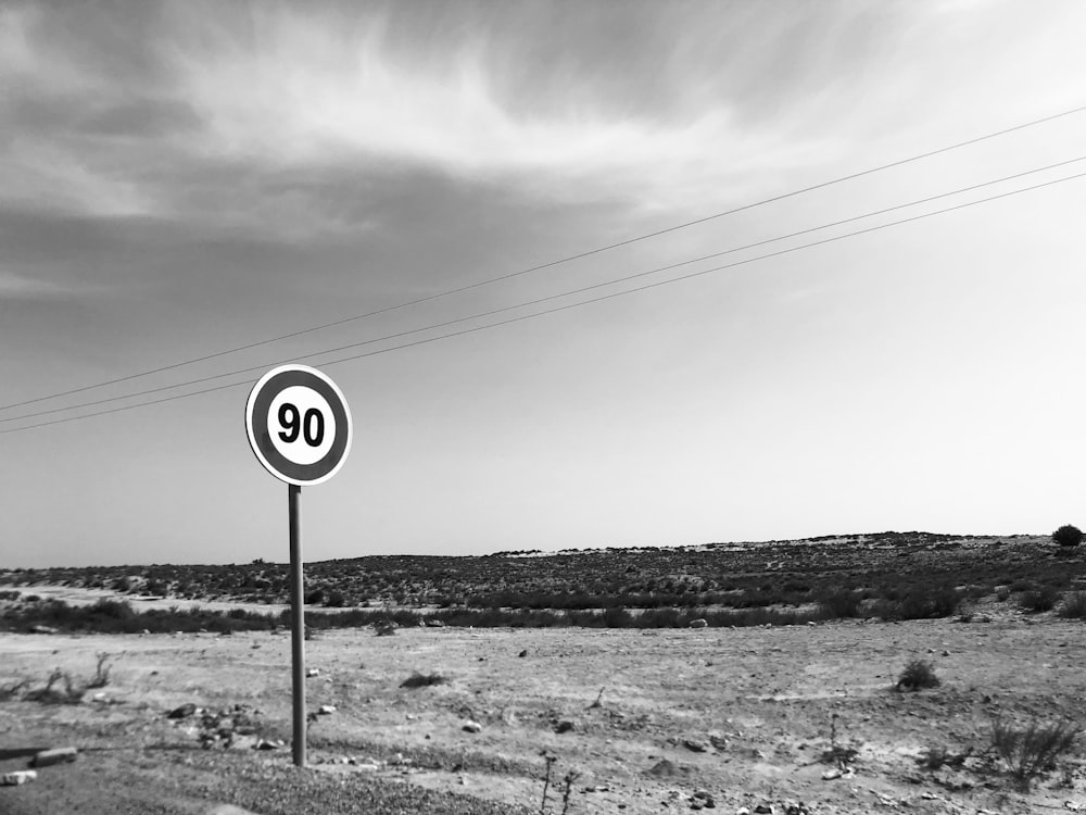 grayscale photo of no smoking sign