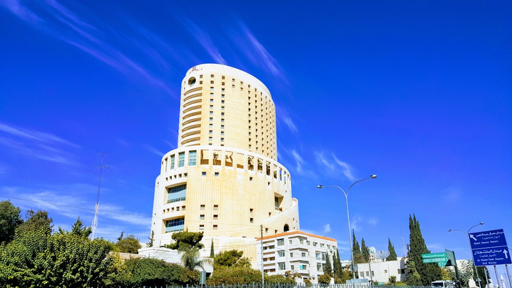 white concrete building under blue sky during daytime