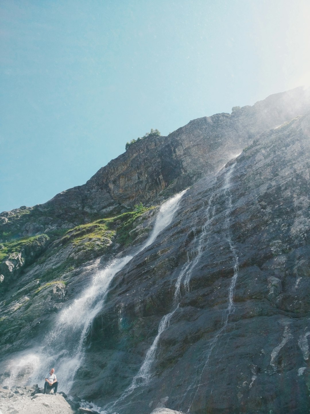 water falls on rocky mountain