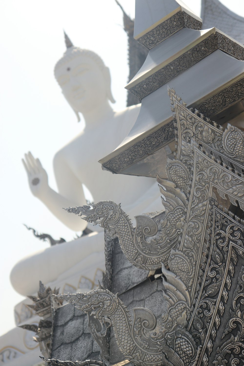 white dragon statue during daytime