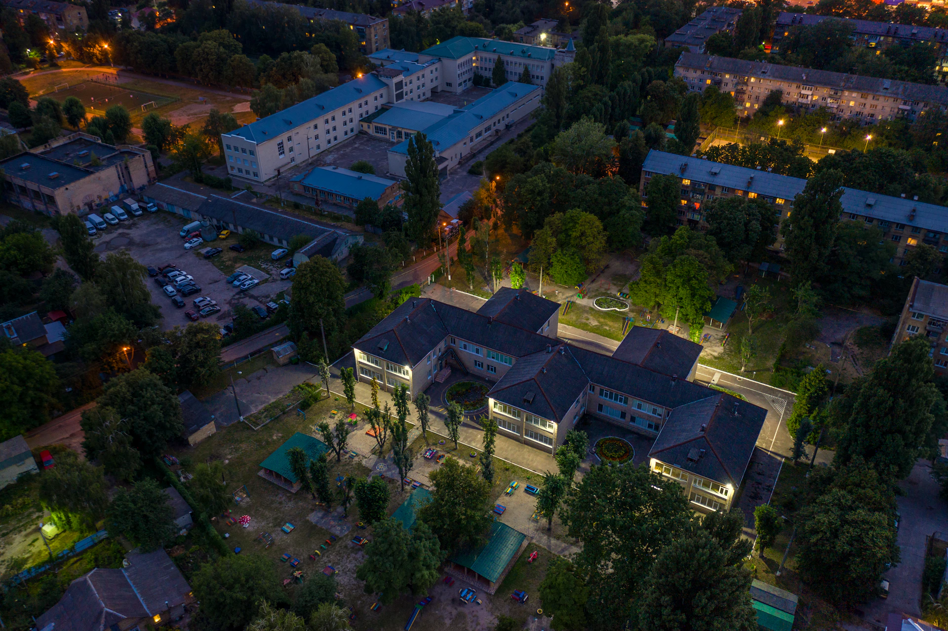 woman wearing yellow long-sleeved dress under white clouds and blue sky during daytime