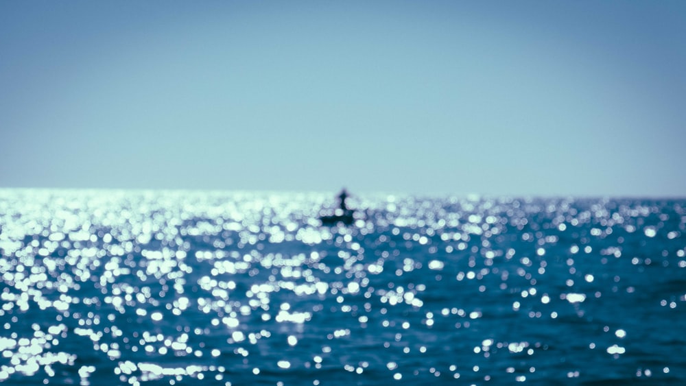 blue sea under blue sky during daytime