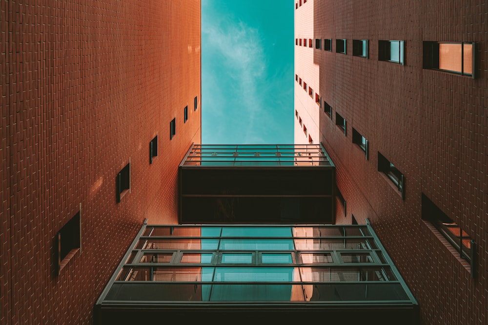 brown concrete building under blue sky during daytime