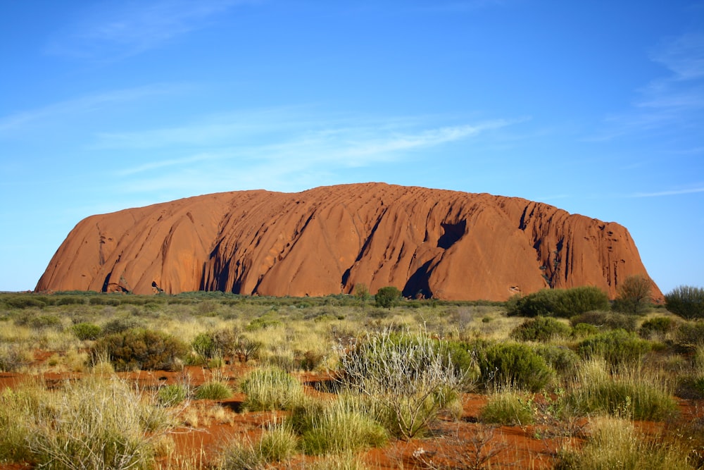 brown mountain under blue sky during daytime