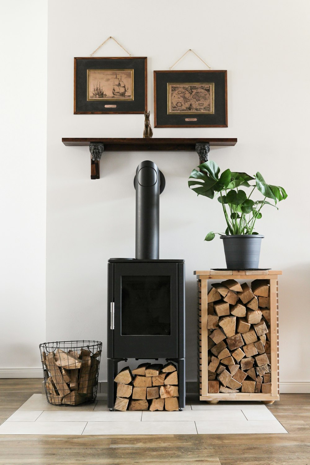 black fireplace beside brown woven basket