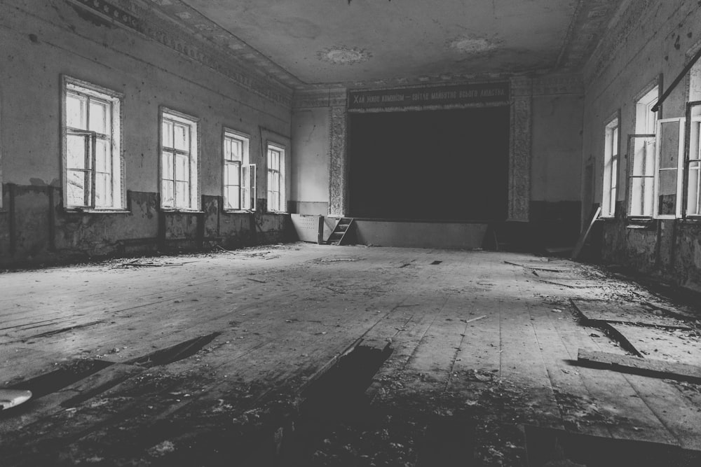 grayscale photo of empty hallway