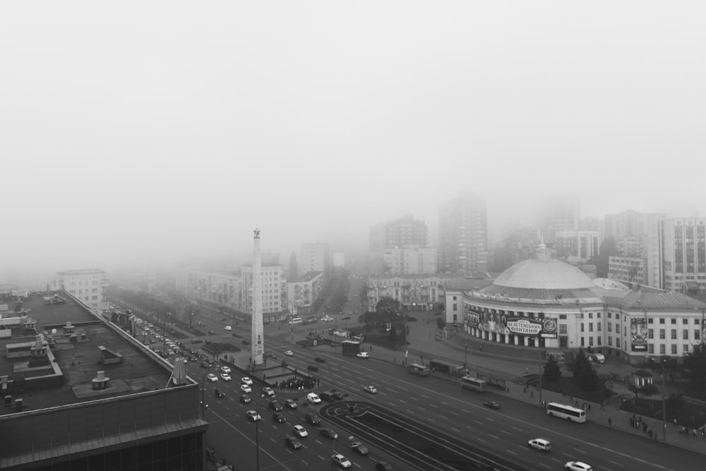 grayscale photo of city buildings