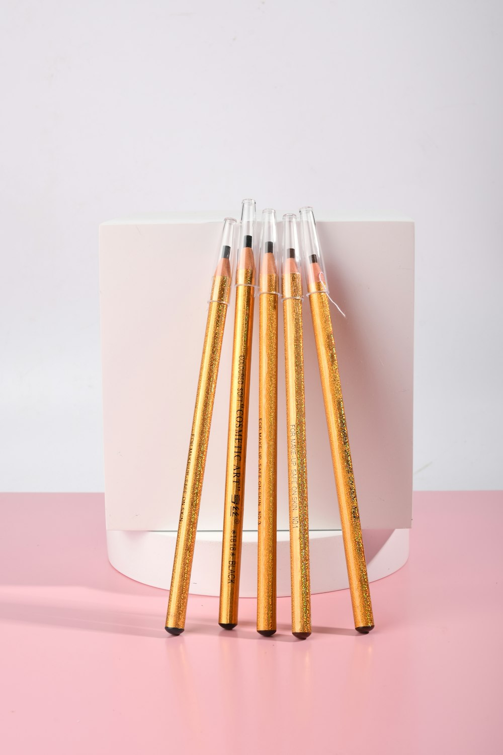 brown wooden sticks on white table