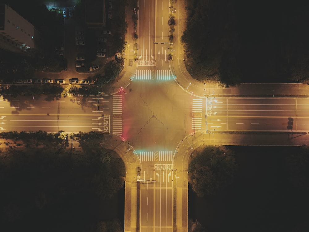 time lapse photography of cars on road during night time