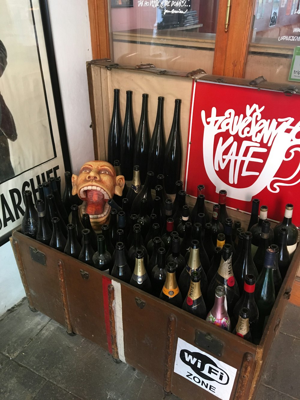 coca cola bottles on brown wooden crate