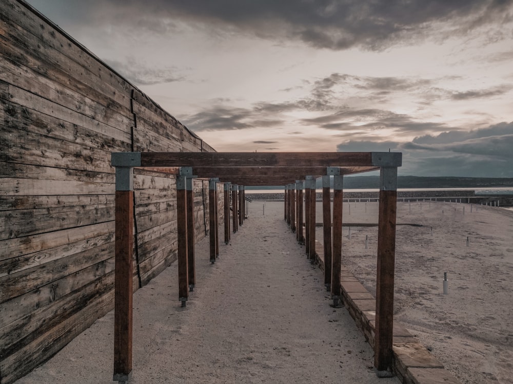 brown wooden dock on sea during daytime