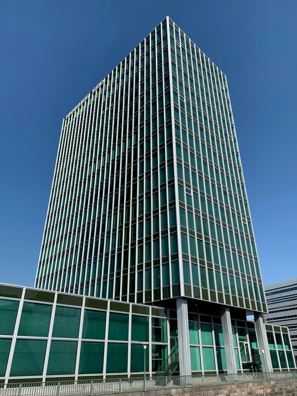 gray concrete building under blue sky during daytime