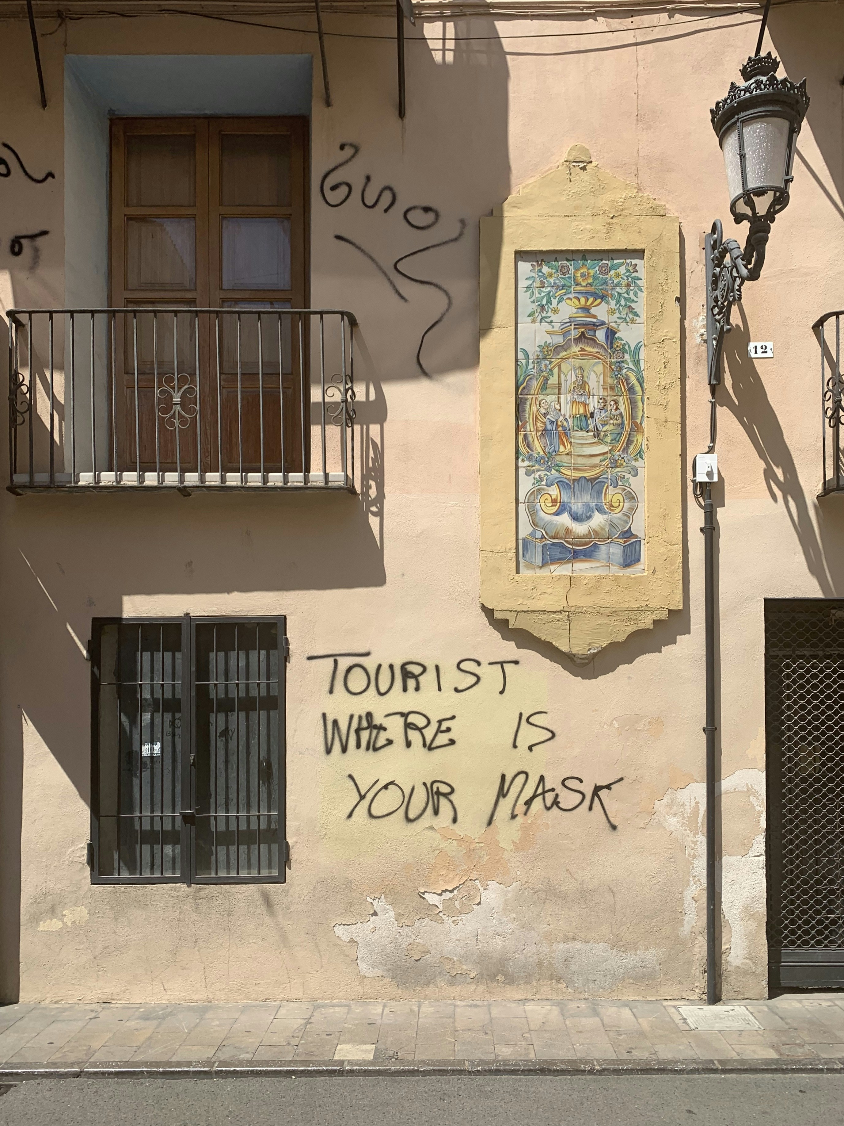 ‘Tourist where is your mask’ painted on a wall in Valencia, Spain. Photo taken 26th July 2020.