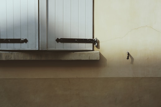 black metal wall mounted rack