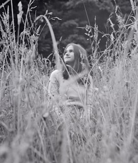 Black and white photograph capturing a moment of quiet reflection in nature