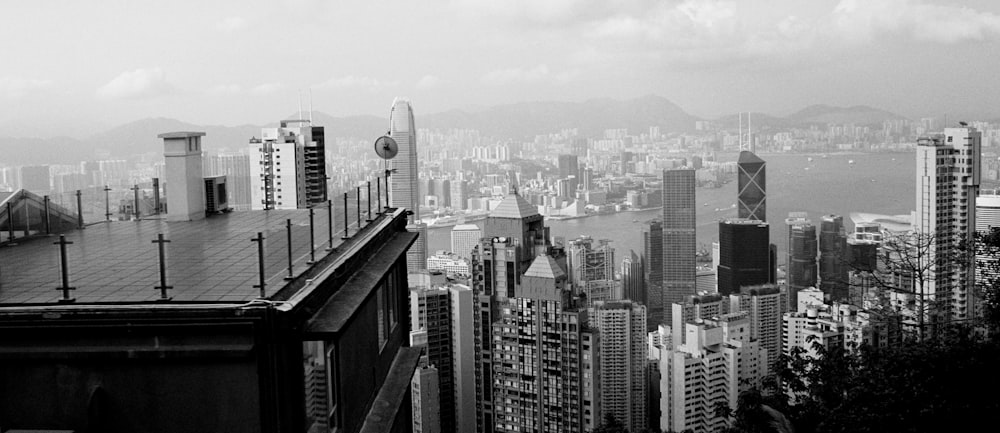 grayscale photo of city buildings