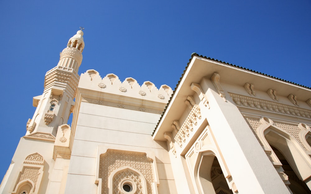 white concrete building under blue sky during daytime