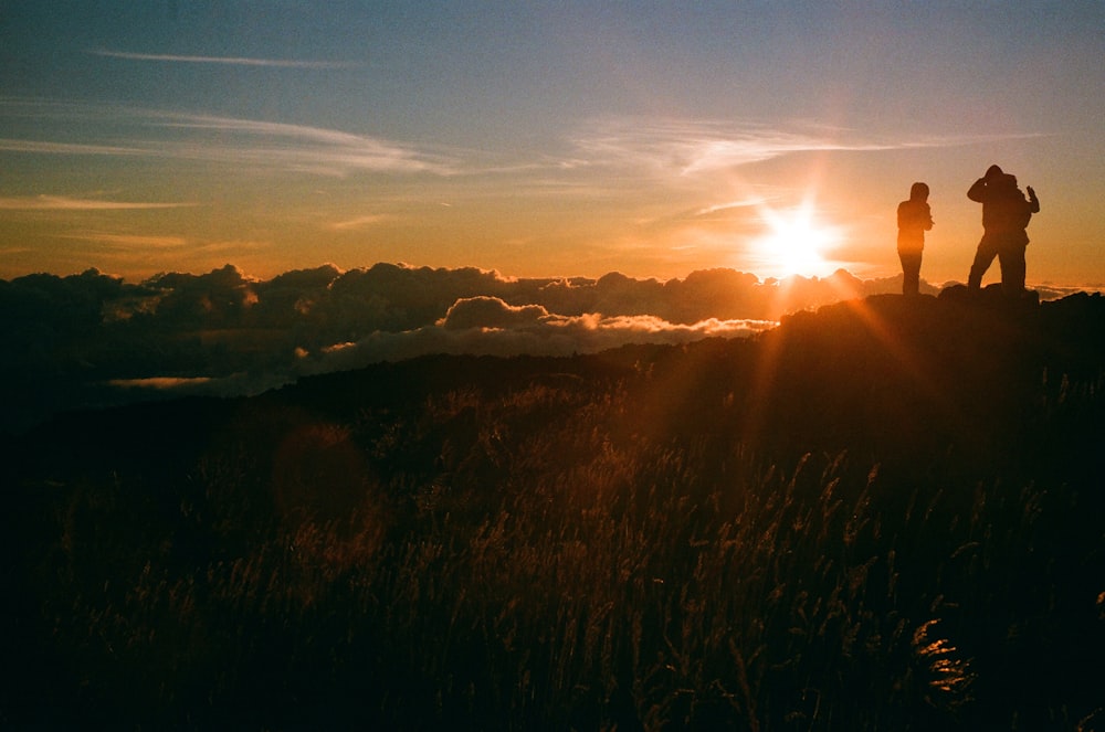 silhouette of mountains during sunset