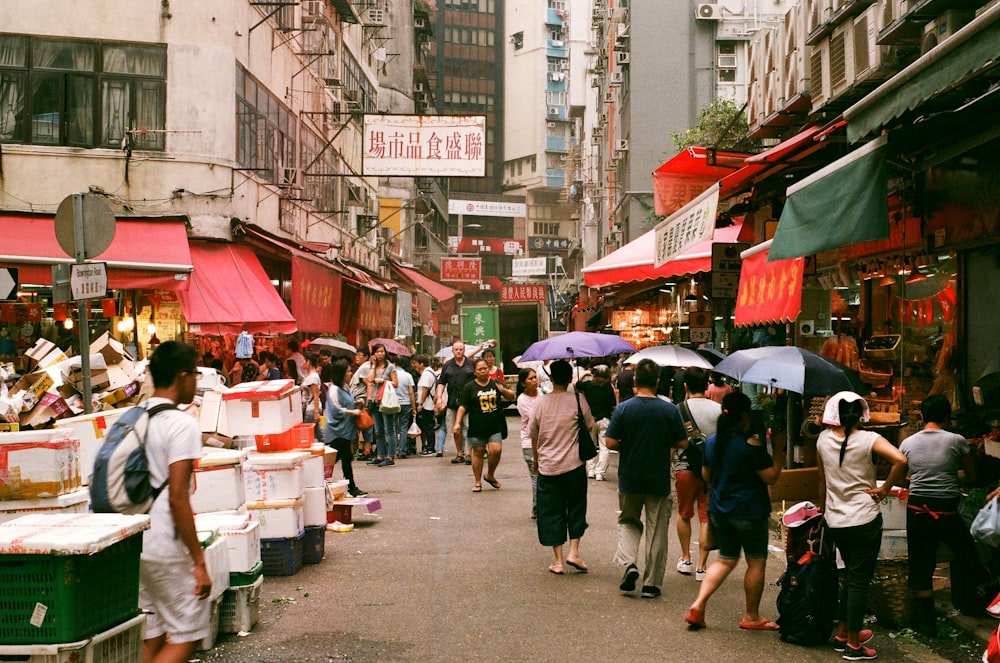 people walking on street during daytime