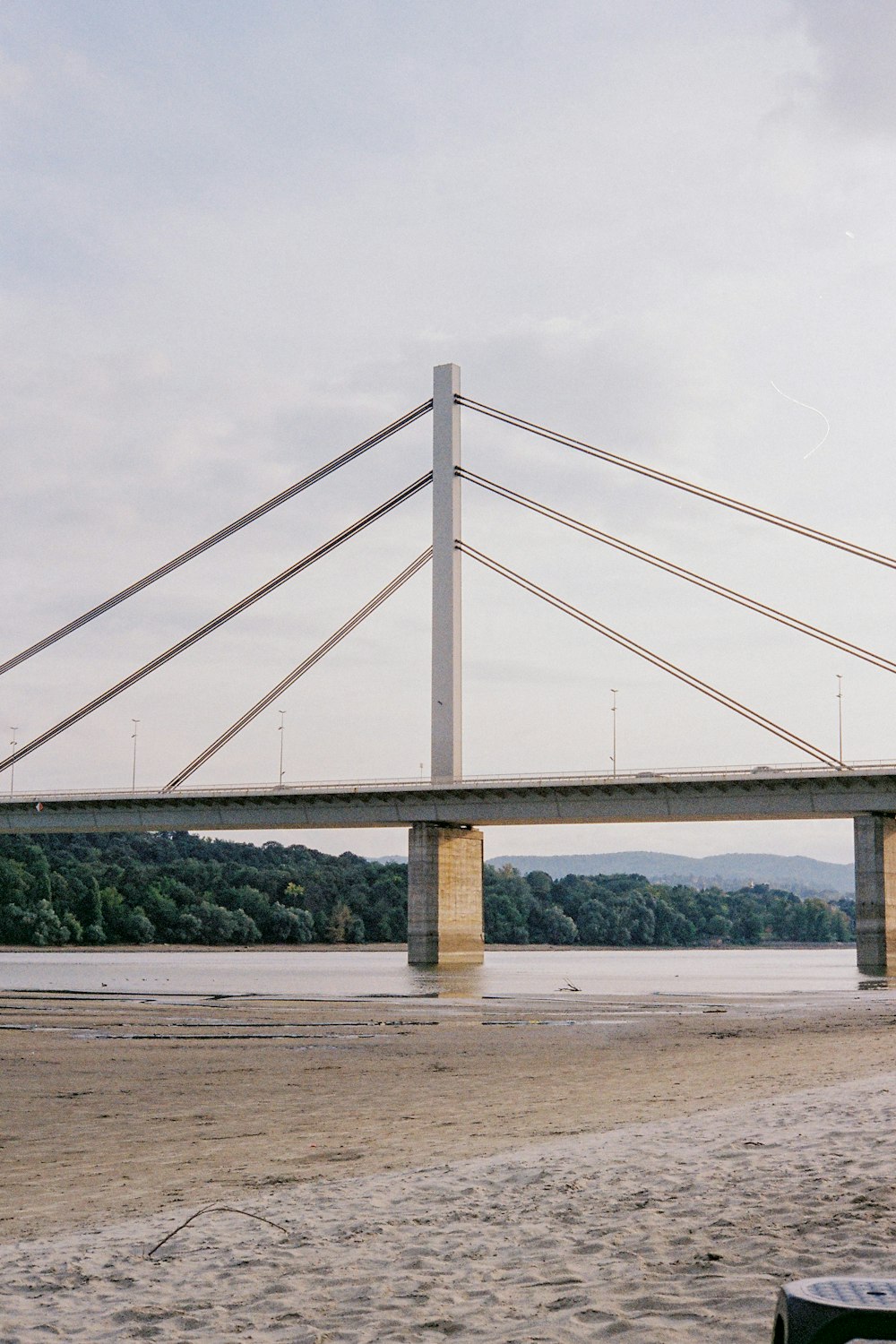 white bridge under white sky during daytime