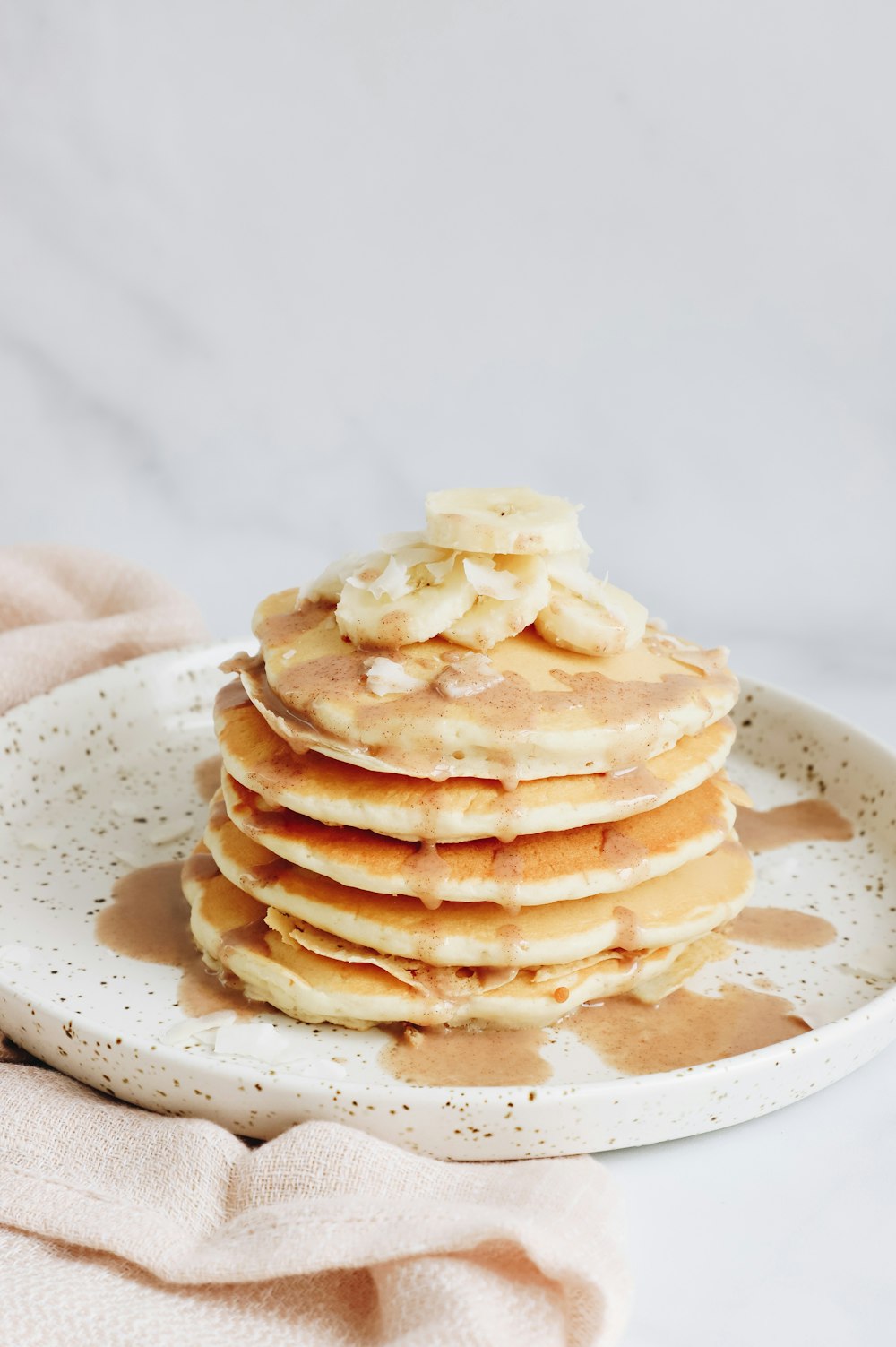 pancakes on white ceramic plate