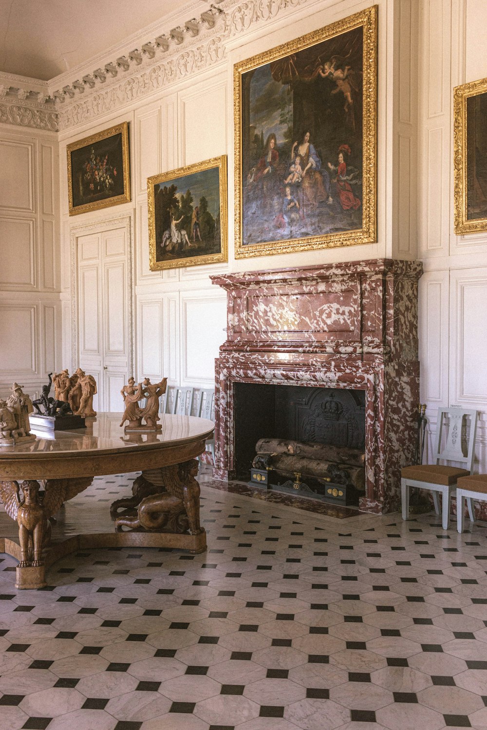 brown wooden table near fireplace