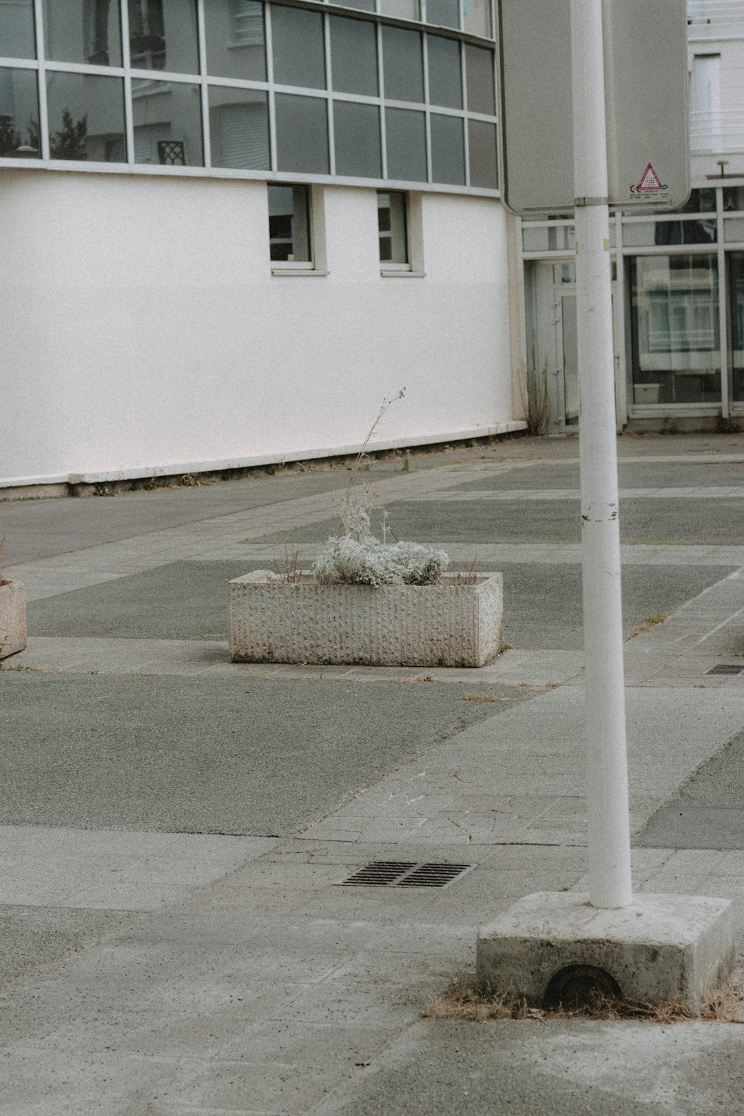 white concrete building near road during daytime