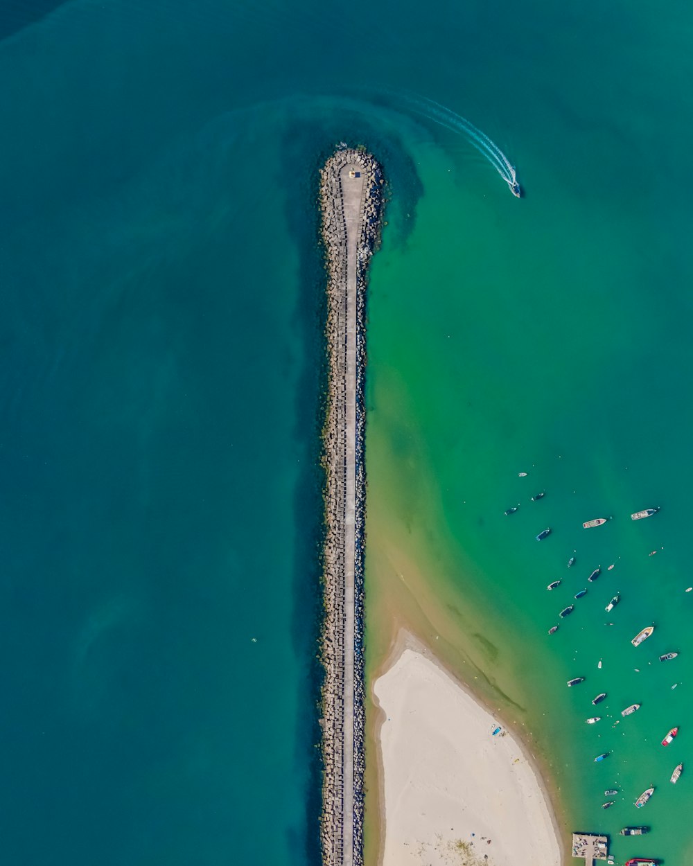 aerial view of green body of water during daytime