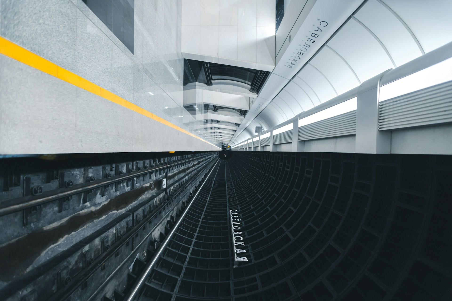 black and white tunnel with white lights