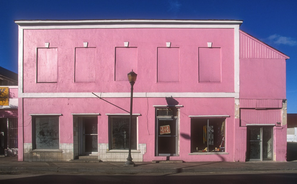 pink and white painted building