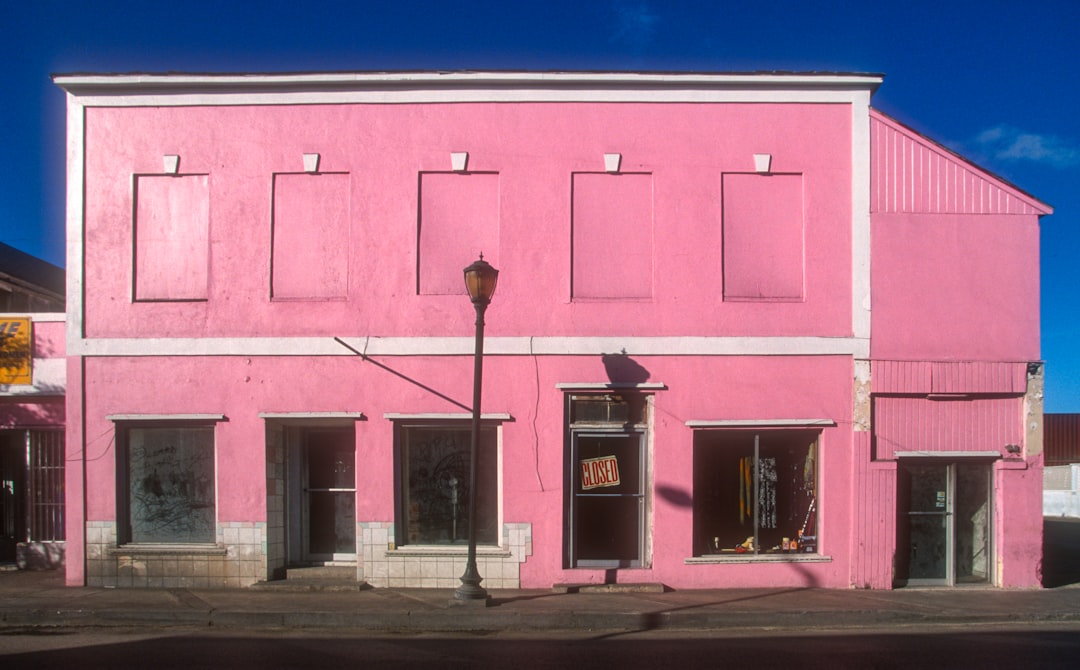 pink and white painted building