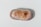 A polished, oval-shaped stone with a smooth surface. The stone features a mix of reddish and brownish hues with streaks of cream and white. It has a glossy finish, highlighting the natural patterns on its surface.