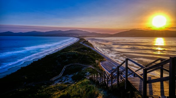 Brown wooden bridge over the sea during daytime — Tasmania, Australia