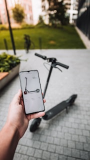 person holding silver iphone 6