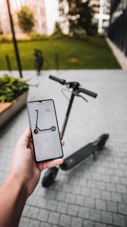 person holding silver iphone 6