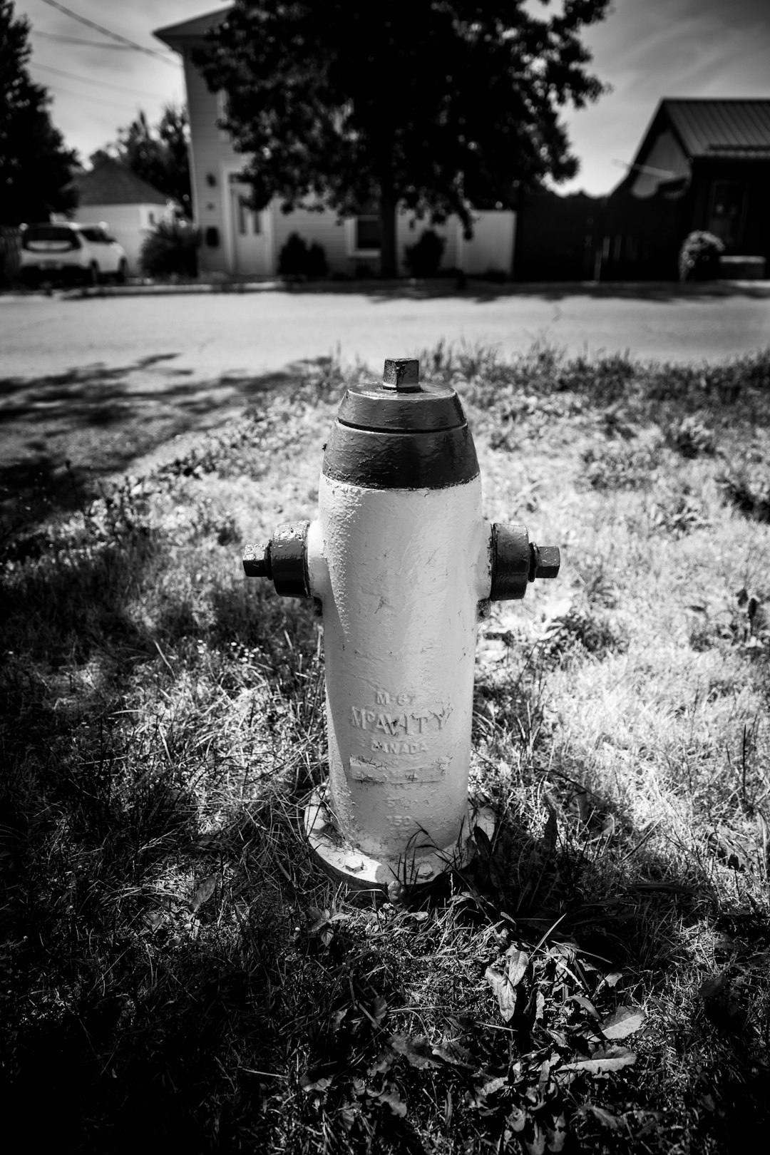 gray scale photo of water jug