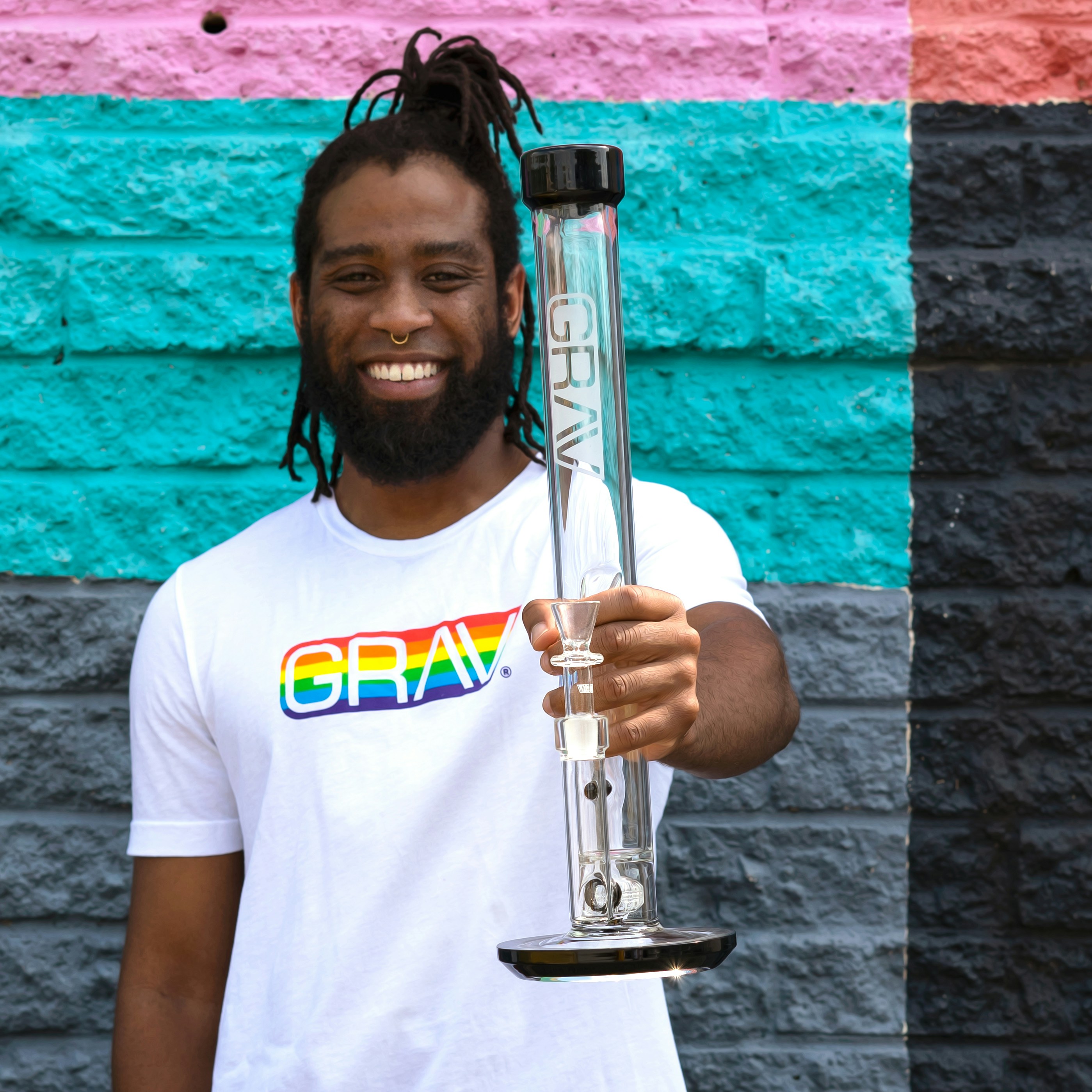 man in white crew neck t-shirt holding trophy